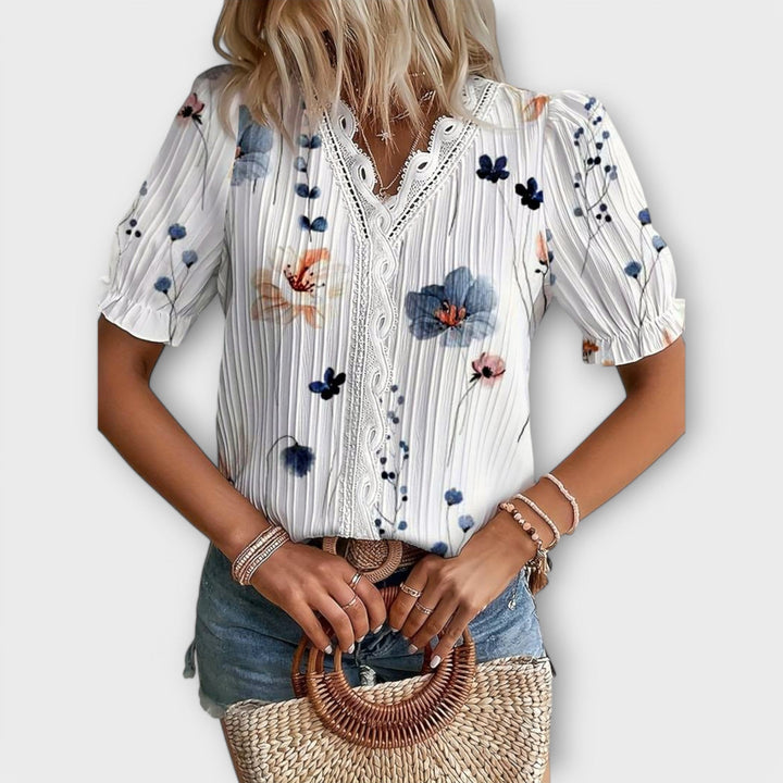 Emily | Fashionable blouse with a pointed neckline